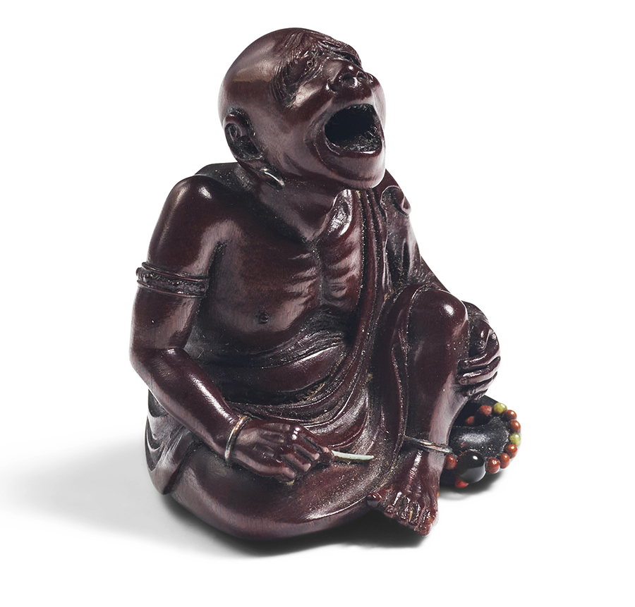 SUZUKI TŌKOKU (1846-1913) A Wood Netsuke of a Self-Tickler Edo period (1615-1868), 19th century. $4,000 - $5,000