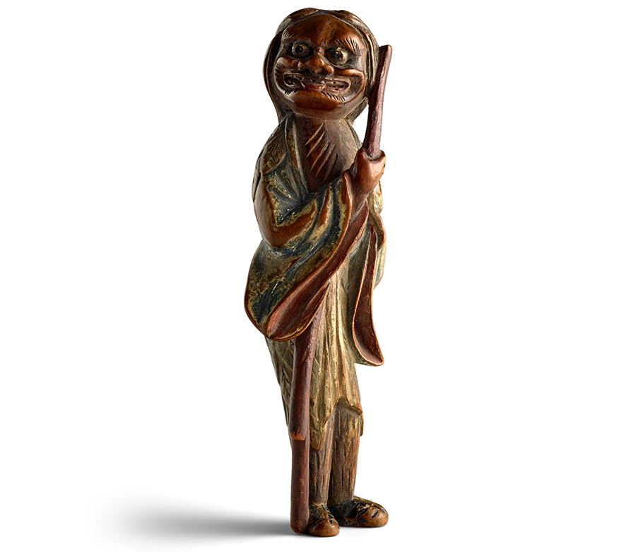 ATTRIBUTED TO YOSHIMUSA SHŪZAN (ACTIVE LATE 18TH CENTURY) A Painted Wood Netsuke of Gama Sennin Edo period (1615-1868), late 18th century. Estimate: $5,000 - $7,000