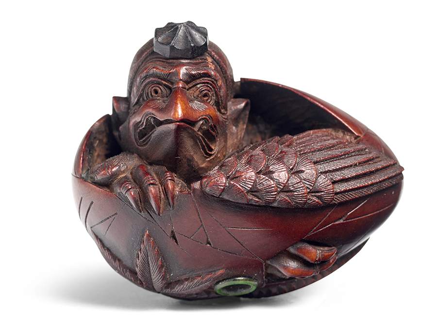HARA SHŪMIN (ACTIVE 19TH CENTURY) A Wood Netsuke of a Hatchling Tengu Edo period (1615-1868), 19th century. Estimate: $2,500 - $3,500