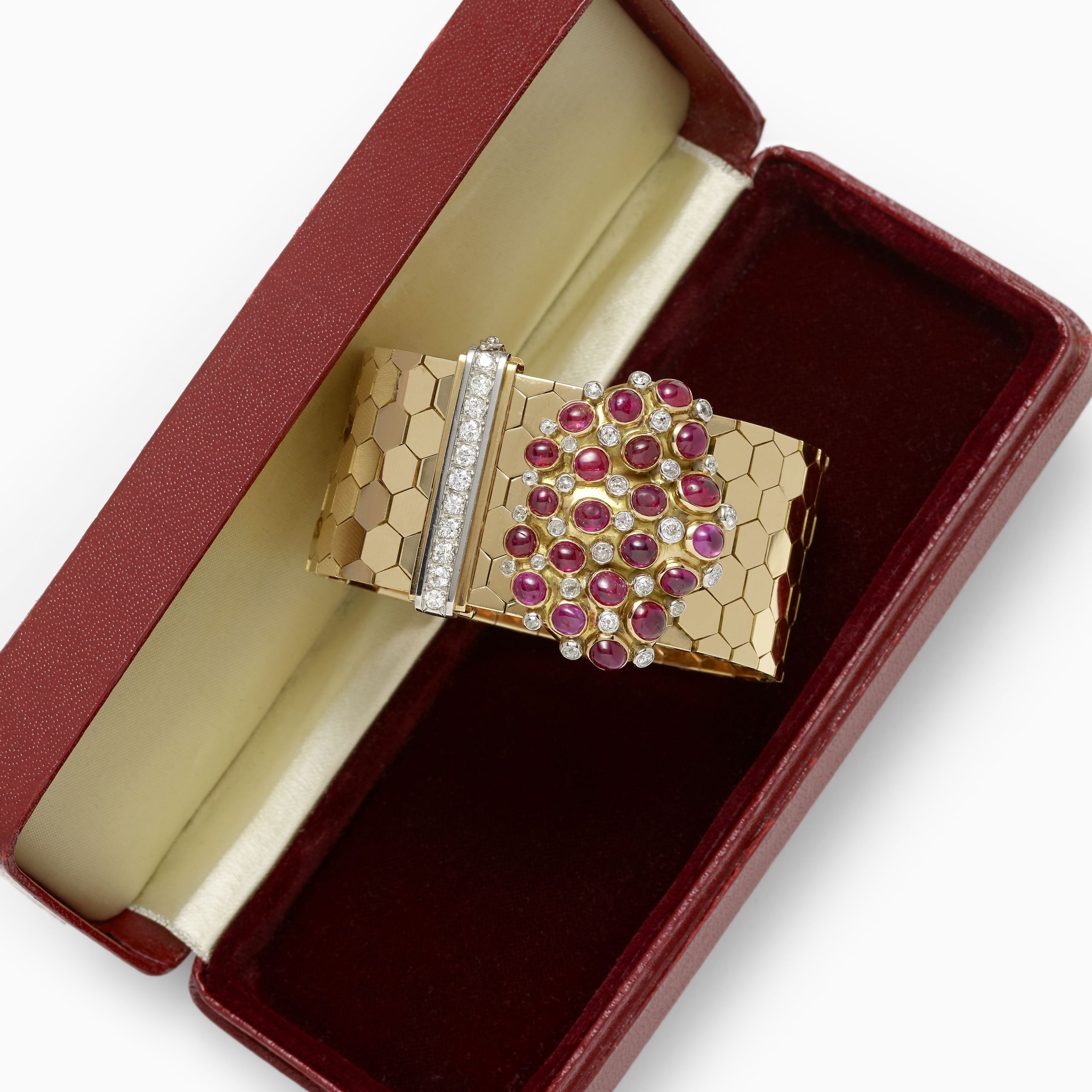 Gold, Ruby and Diamond Buckle Bracelet, circa 1940. Sold for US$ 10,200 inc. premium.