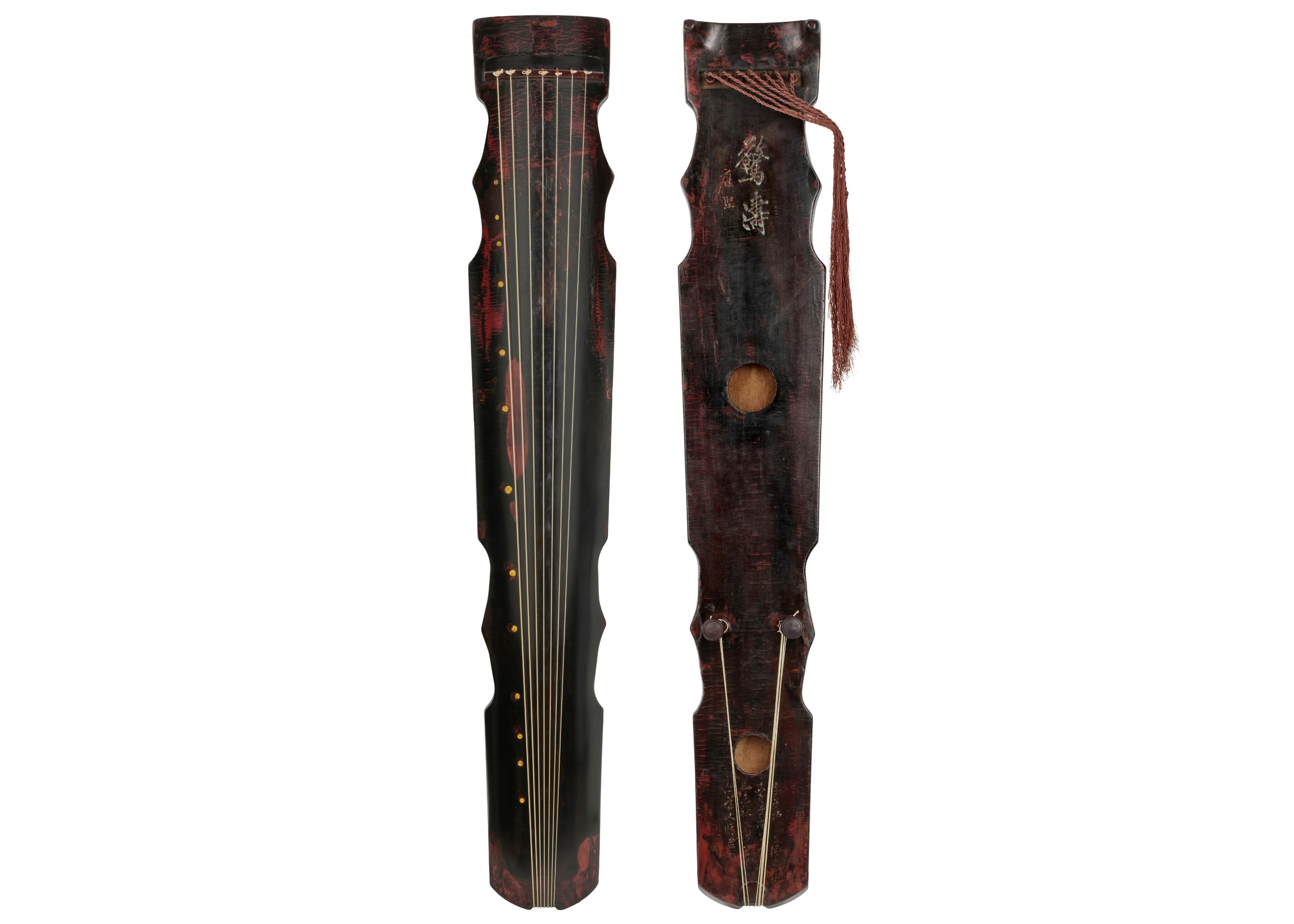 A Very Important Lacquered Fengshi-Style 'Jingtao' Qin. 10th century or earlier. Sold for HK$ 9,852,500 (£ 921,868) inc. premium.