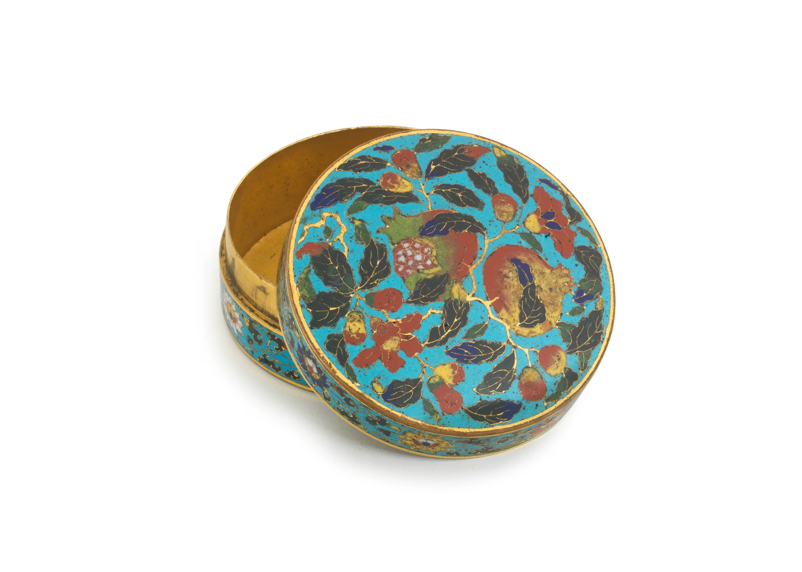 An Extremely Rare and Important Cloisonné Enamel 'Pomegranates' Circular Box and Cover. Incised Xuande six-character marks and of the period. Sold for £ 622,750 inc. premium.