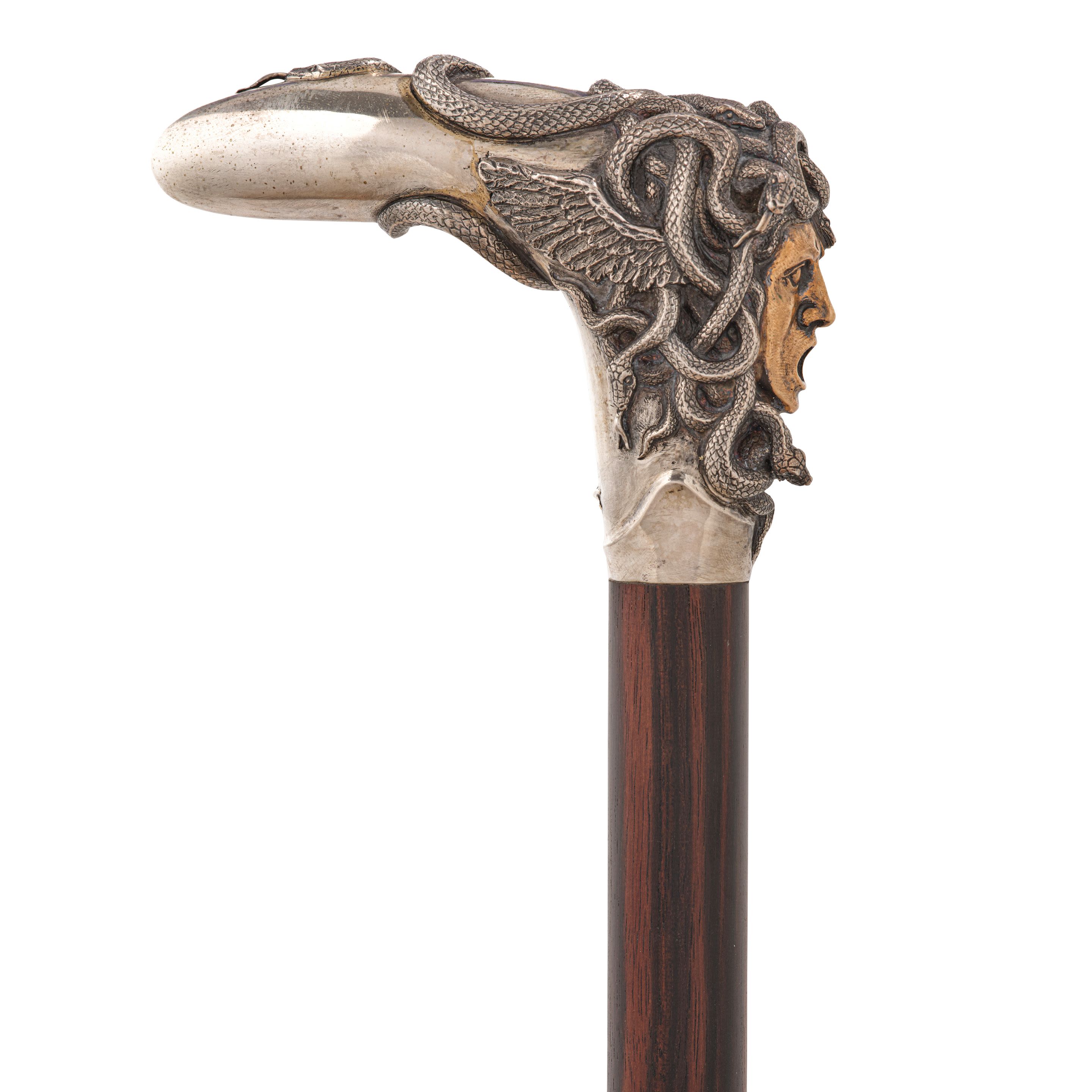A TIFFANY & CO. ART DECO COBALT GLASS INSET STERLING SILVER CANE New York, New York, circa 1935