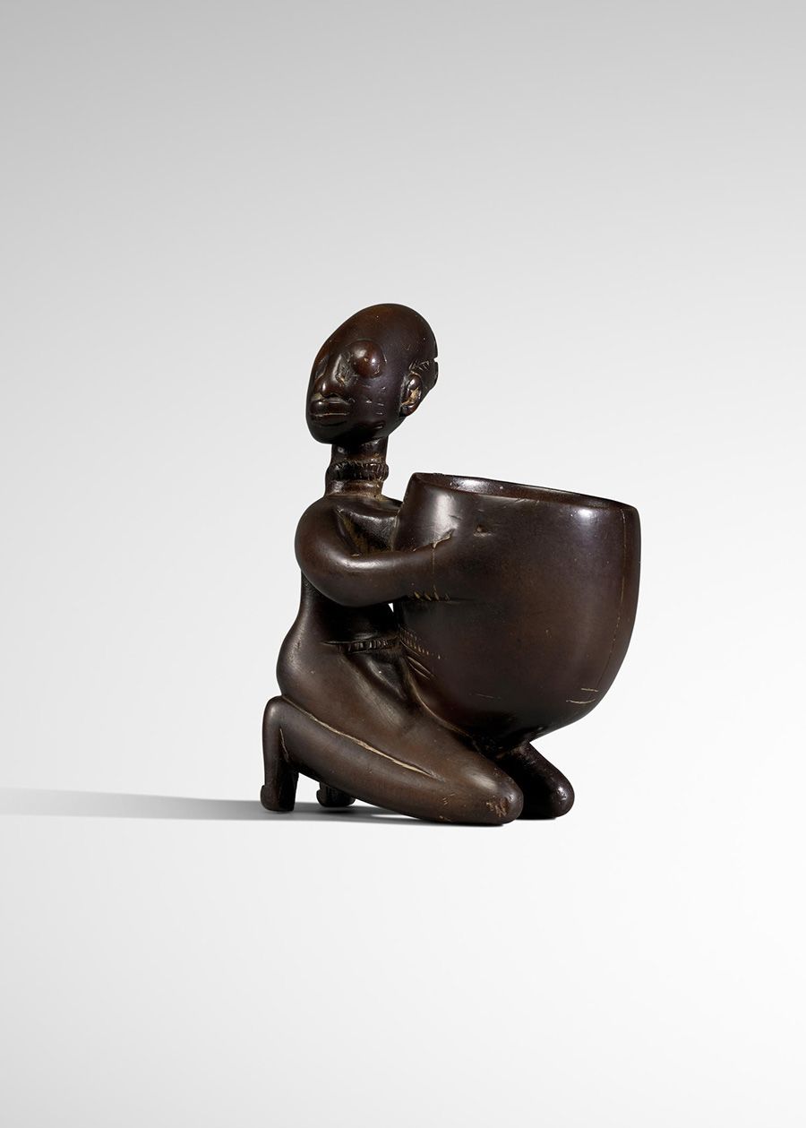 Lot 110. Exceptional Yoruba Kneeling Cup Bearer, Nigeria. Estimate: $60,000 - $80,000