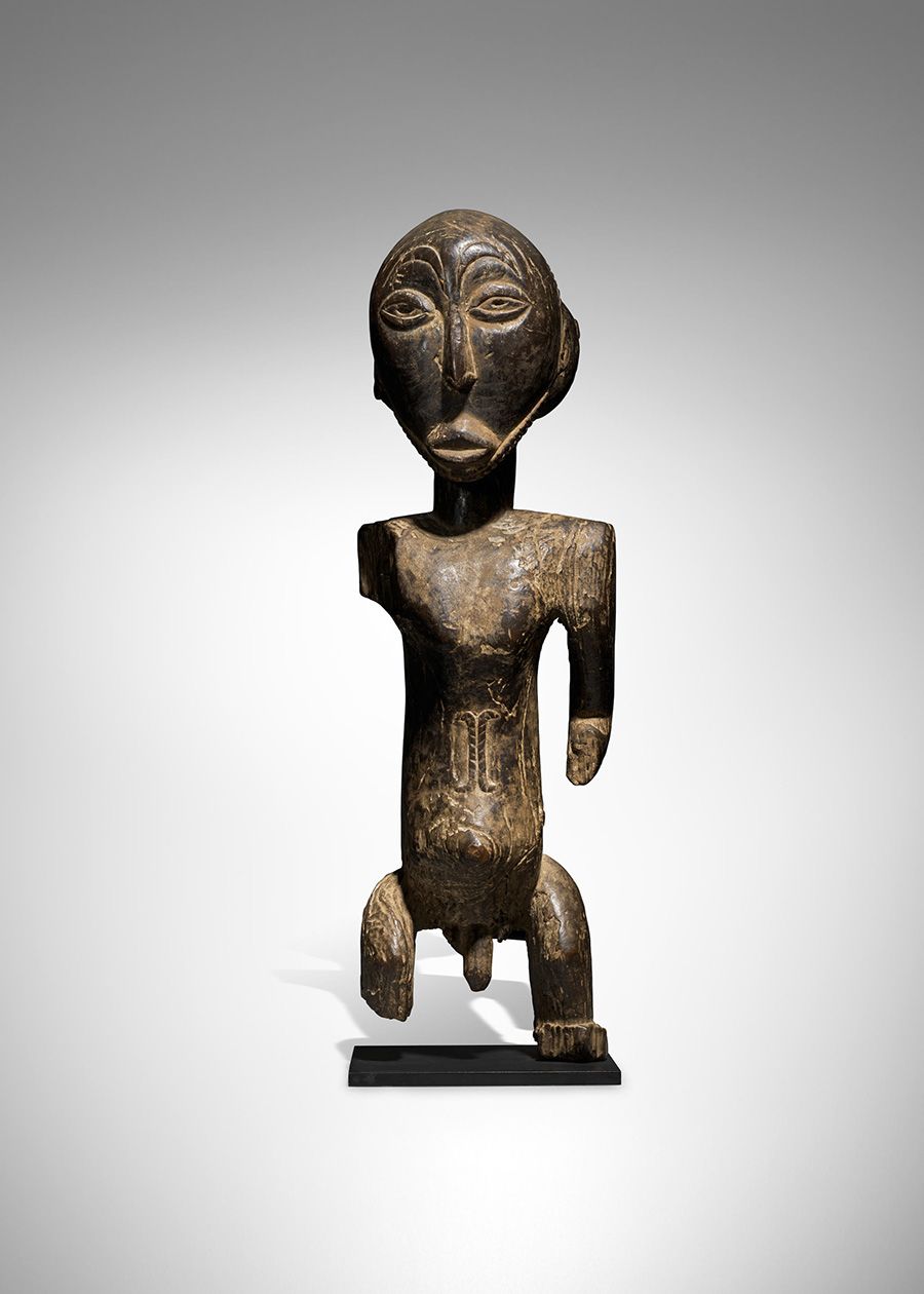 Lot 98. Important Hemba Male Figure, Mambwe Region, Democratic Republic of the Congo. Estimate: $150,000 - $175,000