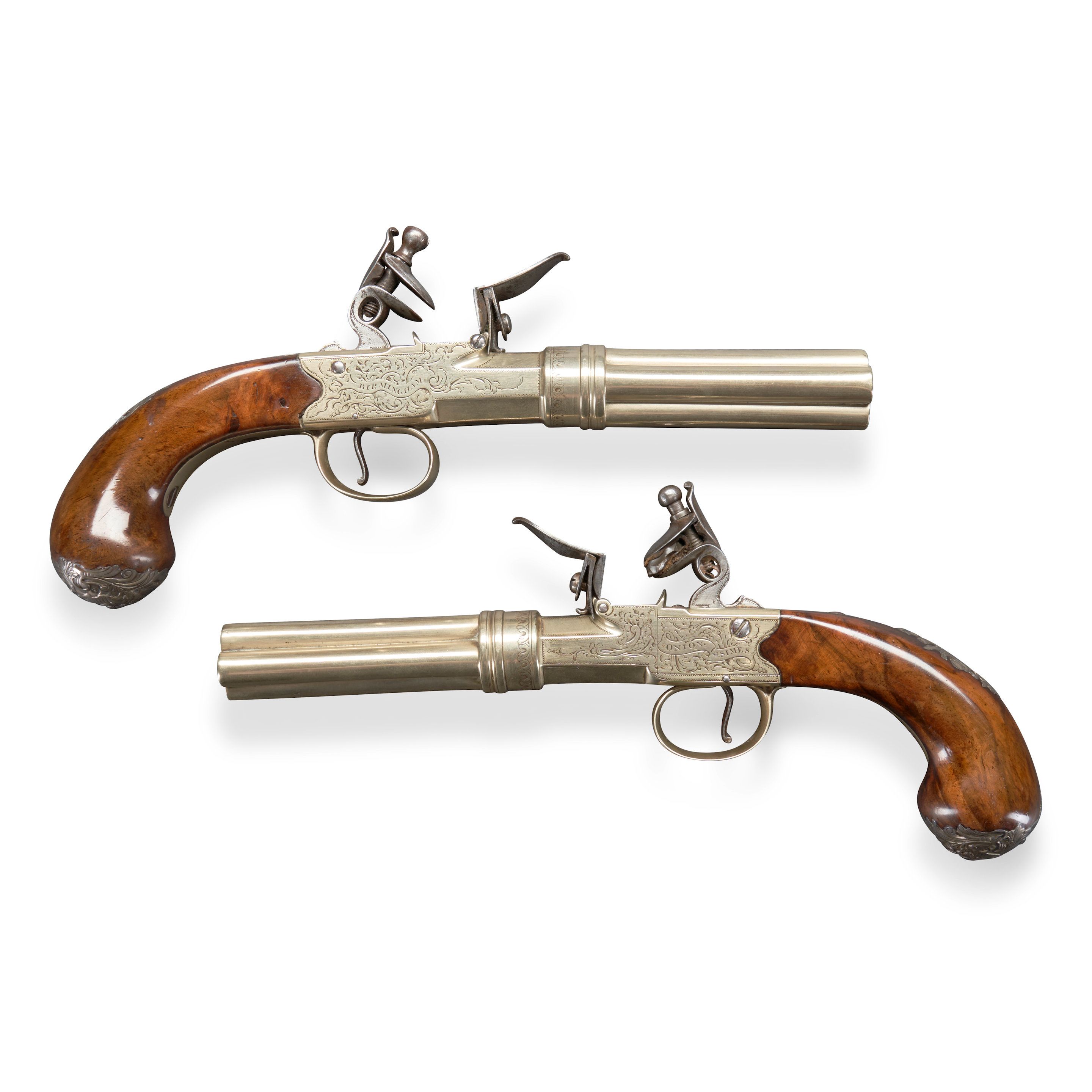 A Pair of Paktong Mounted Four-Barrel Flintlock Volley Pistols, by Onion & Simes, Birmingham, England, 1769-74. Estimate: $3,000-$5,000.